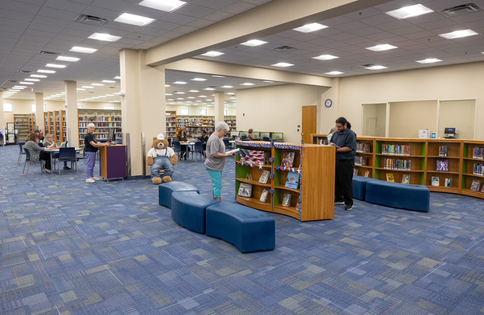 people inside a library
