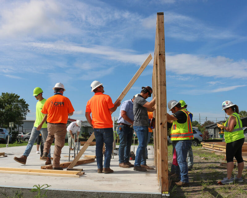 workers setting up framework