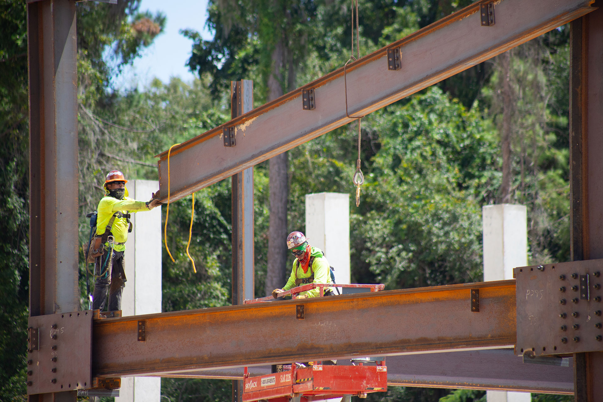 workers on steel beam