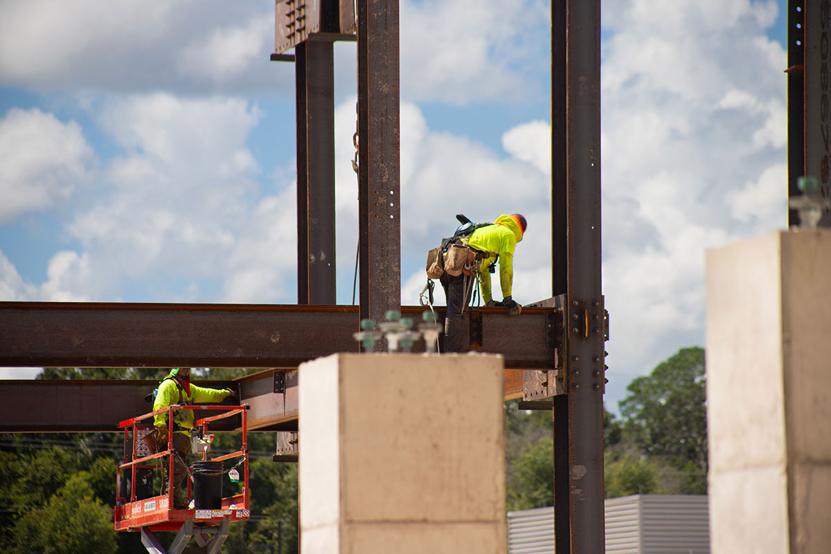 workers on steel beam