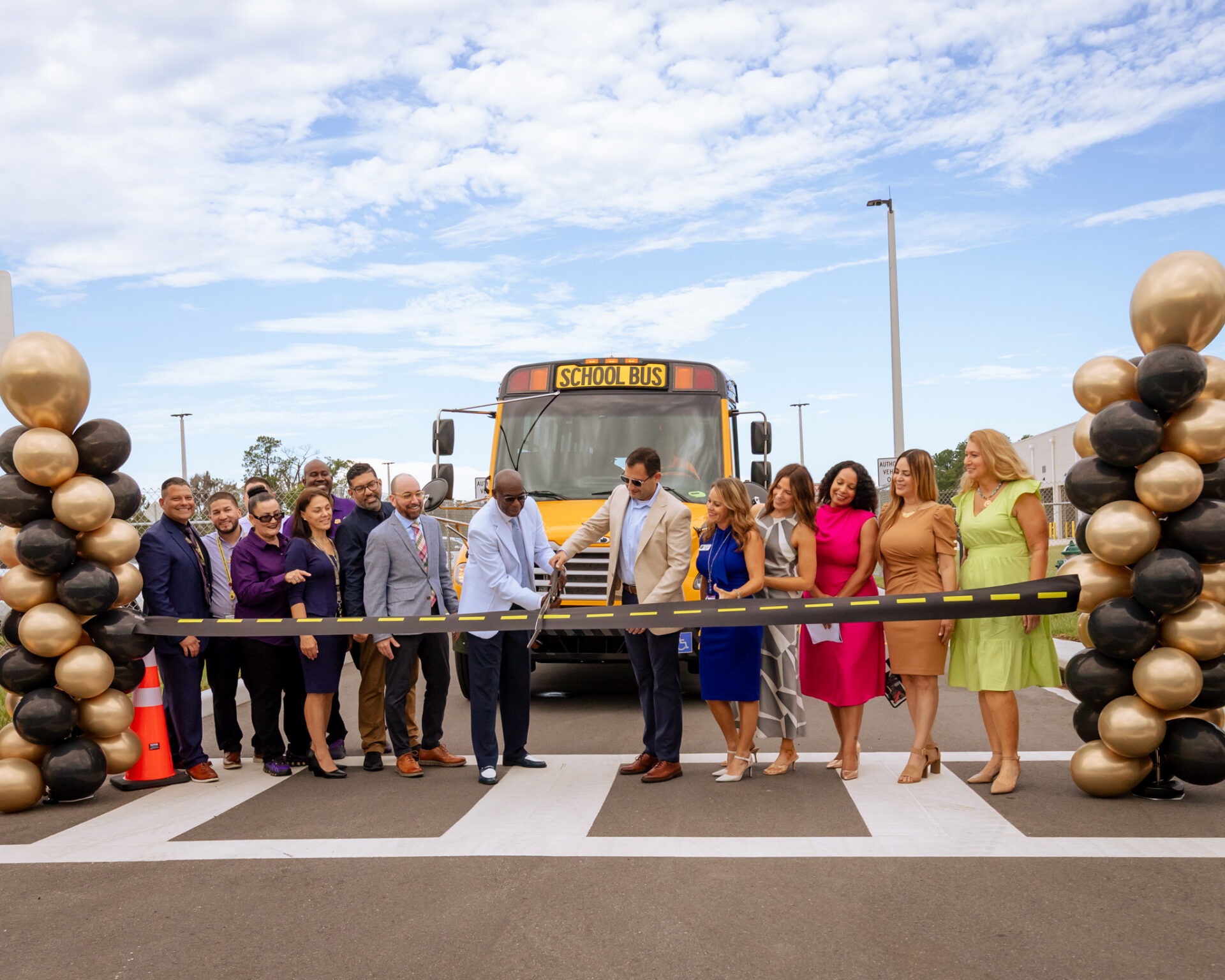 Getting ready to cut the ribbon at the SDOC Transportation West ribbon cutting