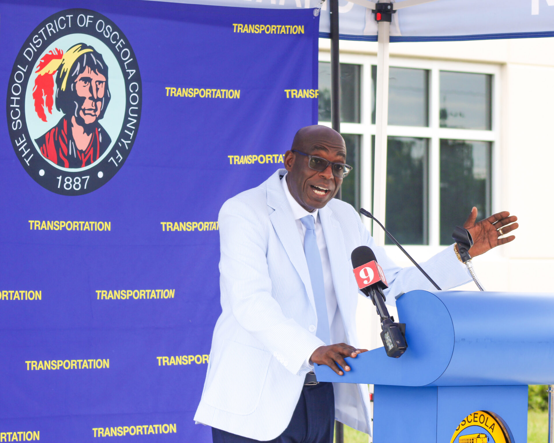 Speaker at the SDOC Transportation West ribbon cutting